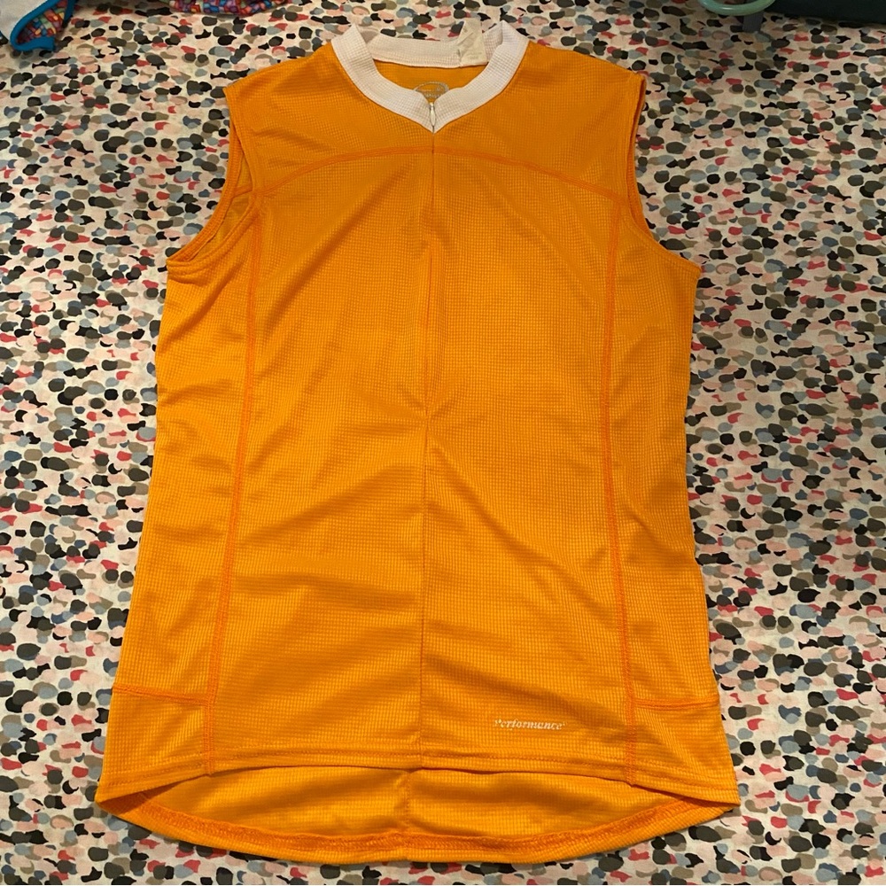 Orange sleeveless cycling jersey